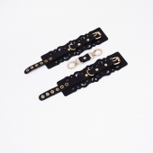 Черные кожаные наручники с узорами и золотистой фурнитурой - Crazy Handmade - купить с доставкой в Махачкале